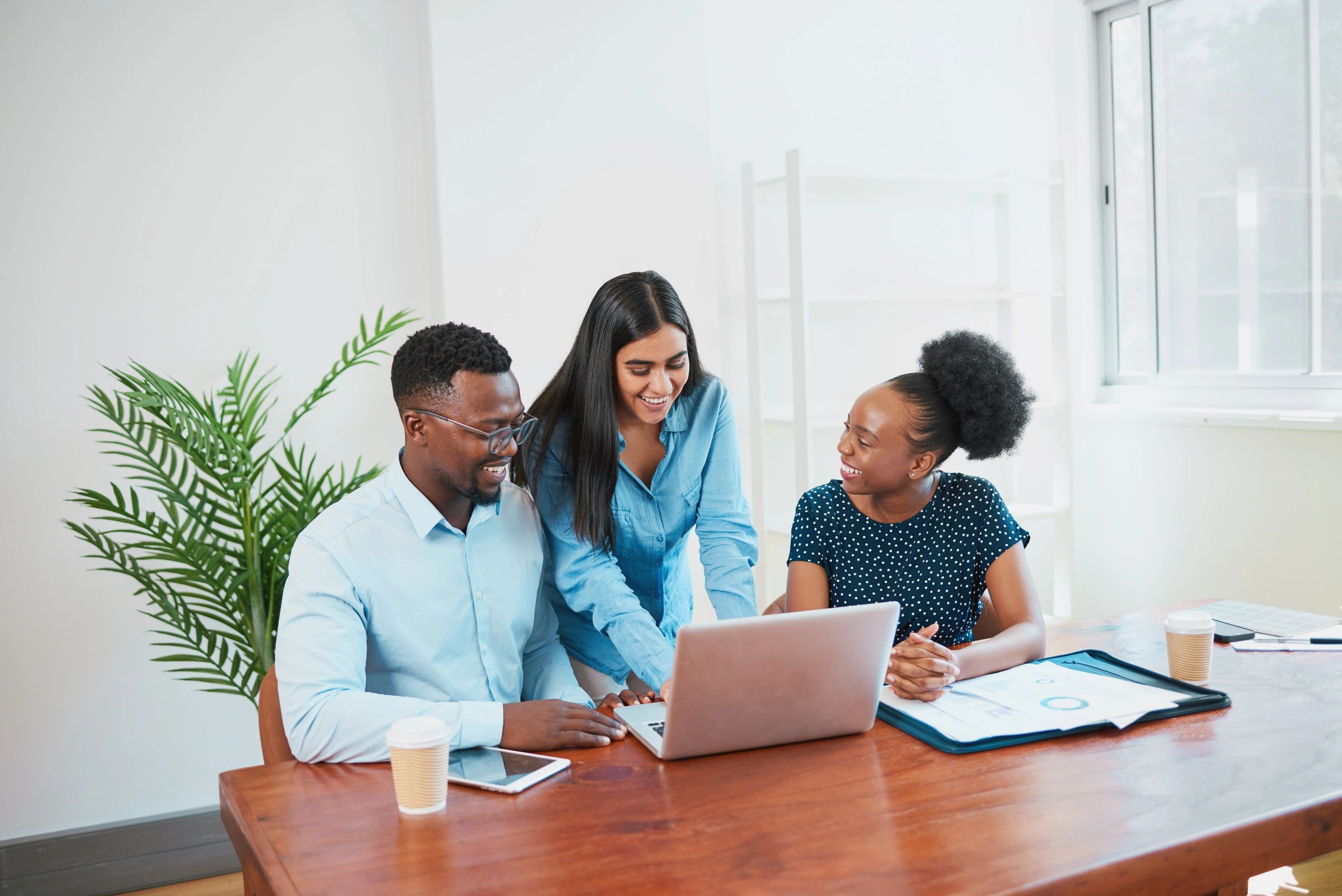 Marketing team collaborating in a boardroom