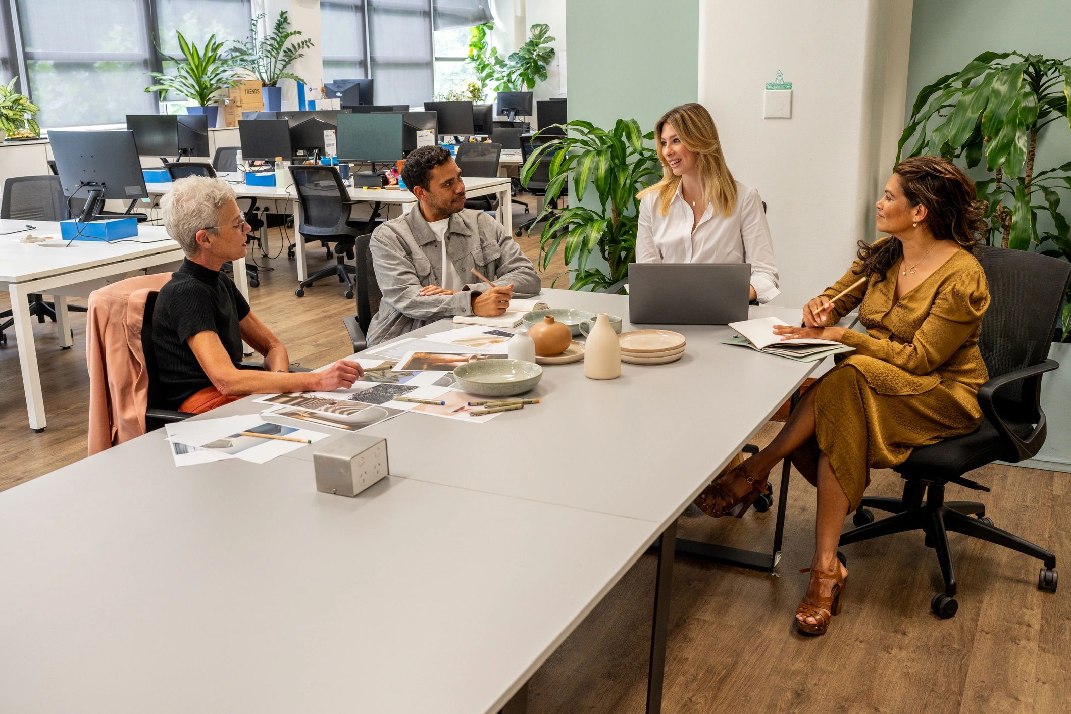 Creative marketing team collaborating in an agency office